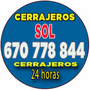 Cerrajeros especializados en Sol Madrid realizando apertura de puertas sin daños